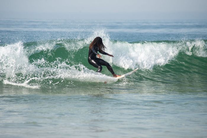 Exciting surf action captured on the lively waves of Portugal's coastline.